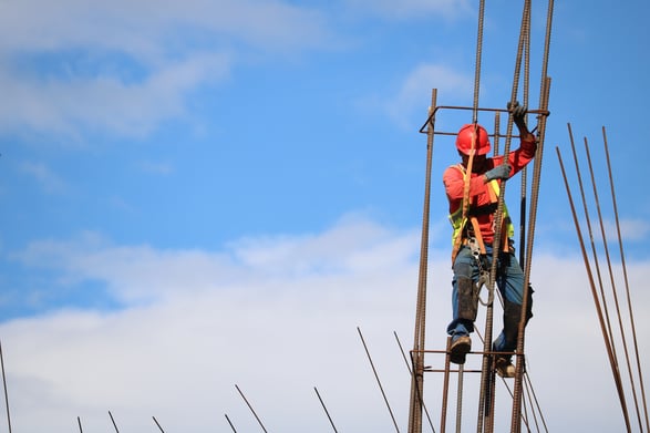 Man wearing a red hard hat